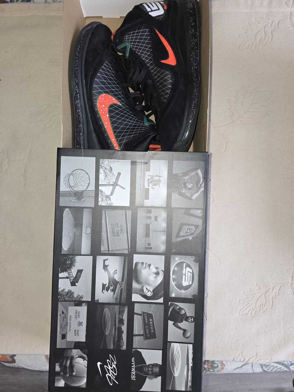 Nike Black Basketball Shoes with Orange Swoosh